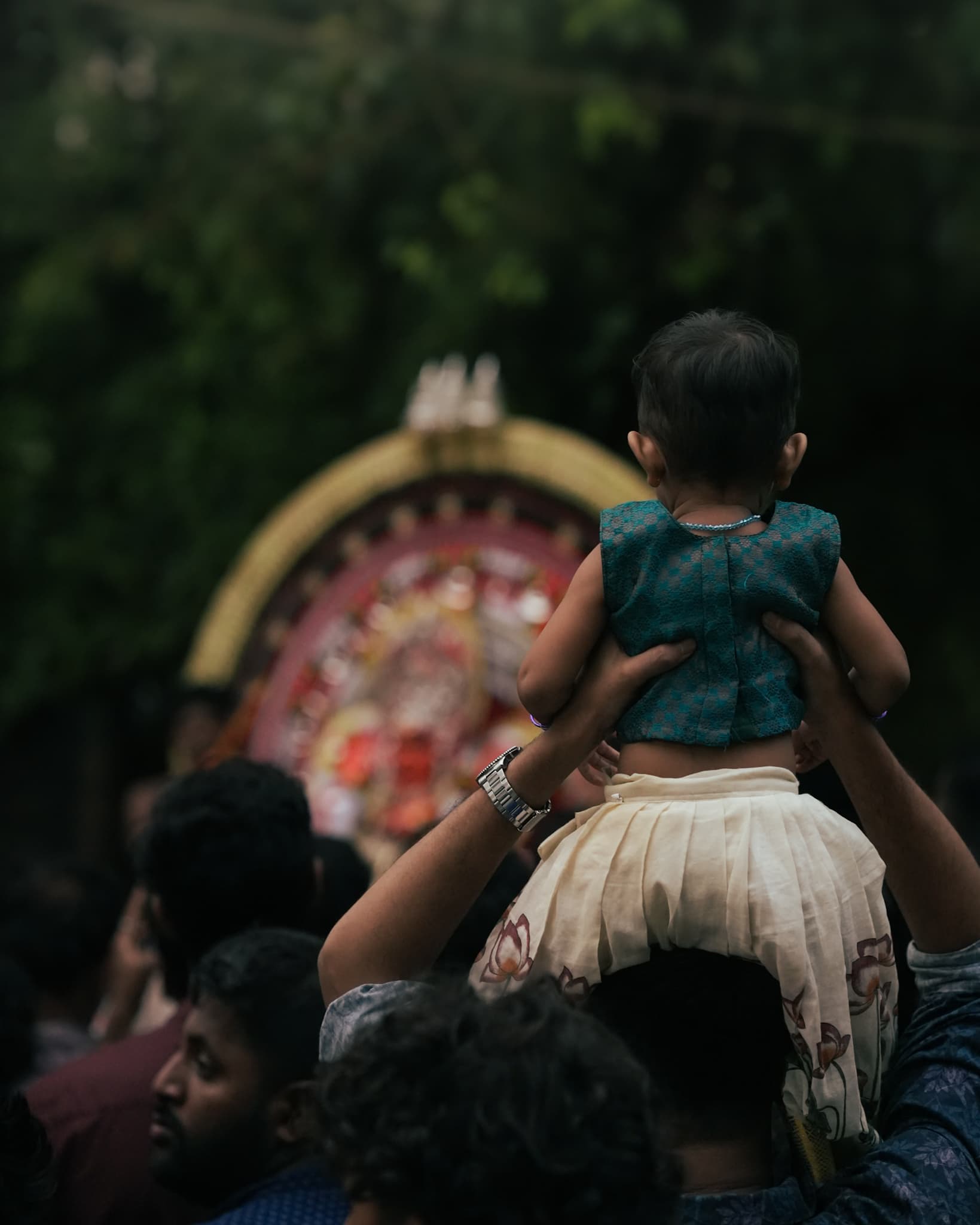 Girl in-front of theyyam